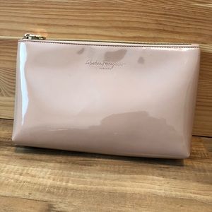 Salvatore Ferragamo cosmetic bag. Can be worn as a clutch as well.